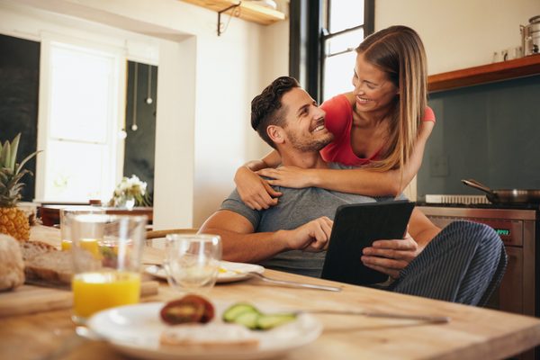 young couple in kitchen