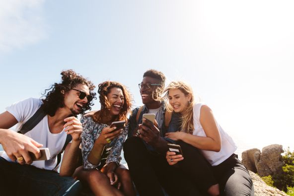 Group of friends with phones