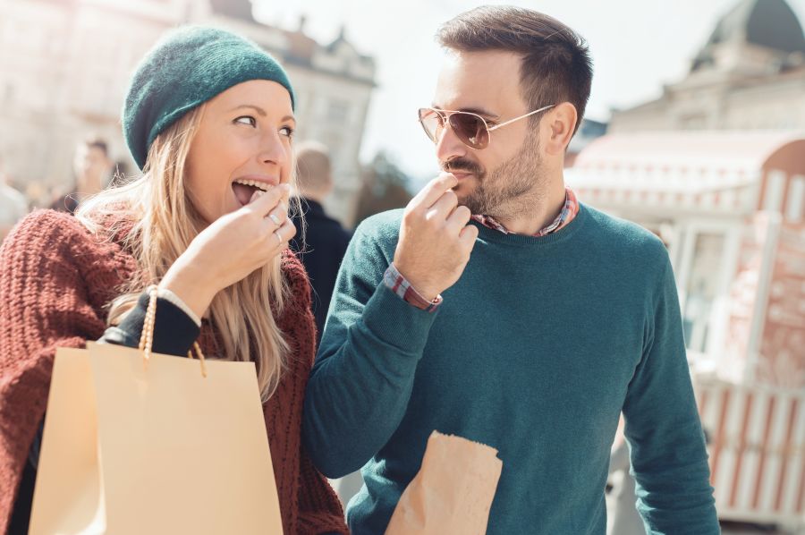 friendzone friends eating snacks while walking